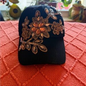 Embellished Black Cap with Floral Design w/ rhinestones.